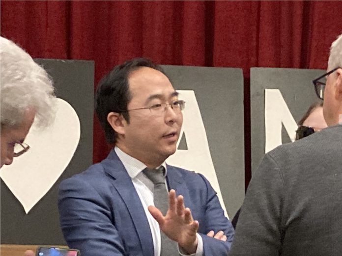 Andy Kim speaks with voters in 2024