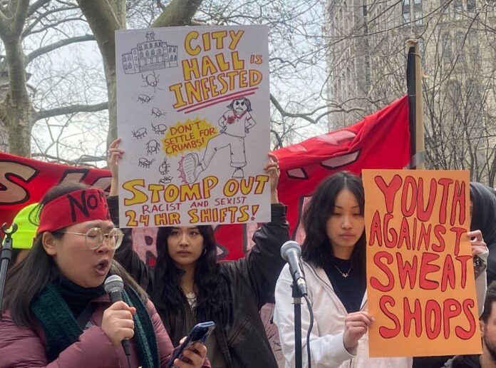 A member of Youth Against Displacement, hunger striking in solidarity with home care workers, speaks during the rally.