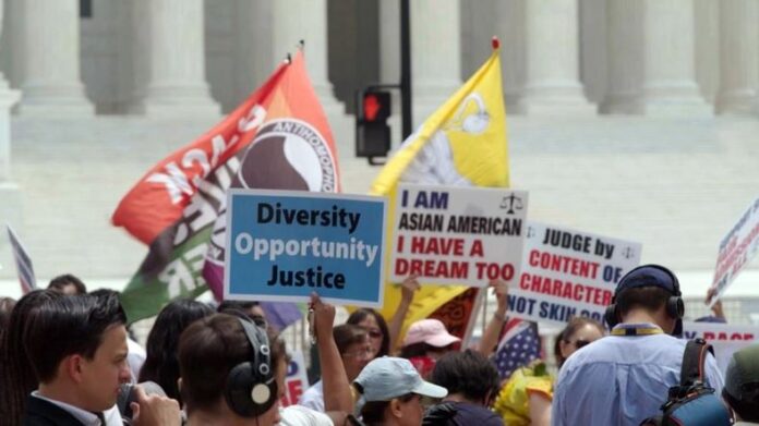 Supporters and opponents of affirmative action protest outside the U.S. Supreme Court