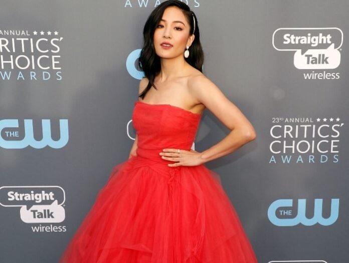 Constance Wu poses at the Critics Choice Awards