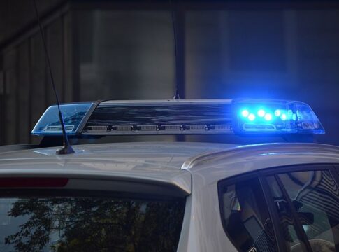 Night scene of an emergency vehicle with flashing lights