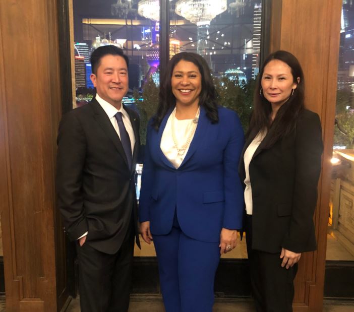 Mark Young with San Francisco Mayor London Breed and Jaynry Mak