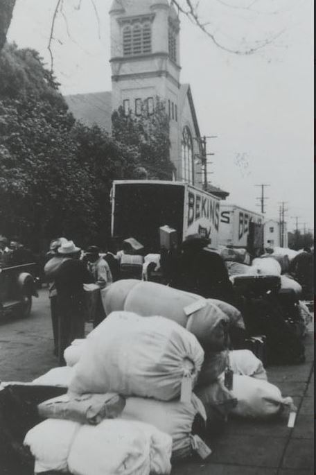 Moving vans to transport possessions from Berkeley to Tanforan Assembly Center