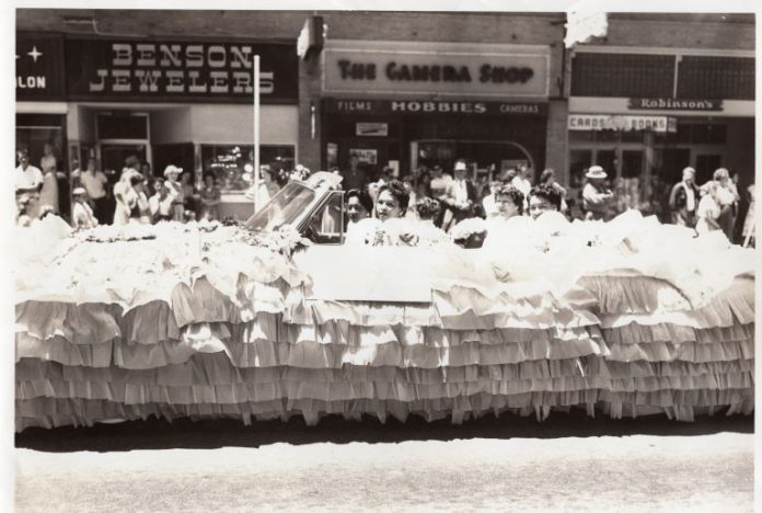 Black and white photo of Filipino women in a car