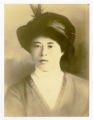 Photo of a woman with hat.