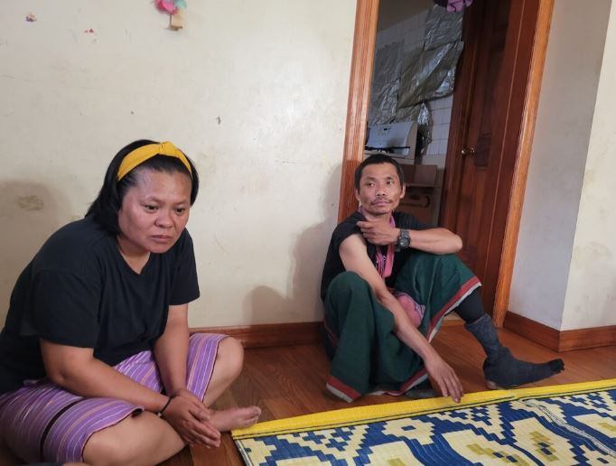 Mway’s parents, Ka Lee Wan (R) and Chee War in their home in Utica. 