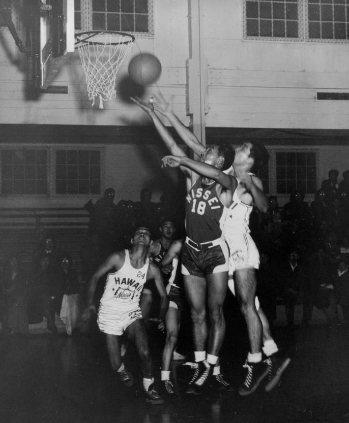 In the late 1940s, Seattle hosted the National Oriental Basketball Tournament with teams competing from Washington, Oregon, California, Hawaii, Illinois and Vancouver, BC. Games like this one were played at the Seattle University Gymnasium.