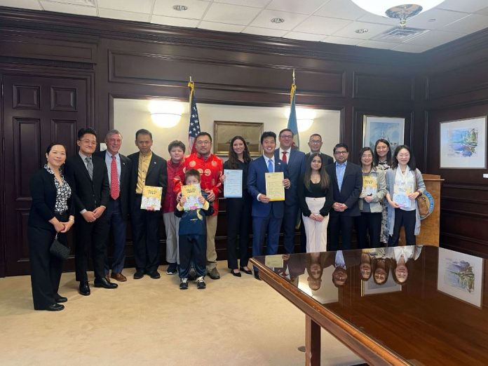 Members of the Asian American community are on hand for the signing of the bill mandating AAPI history in Delaware K-12 schools.