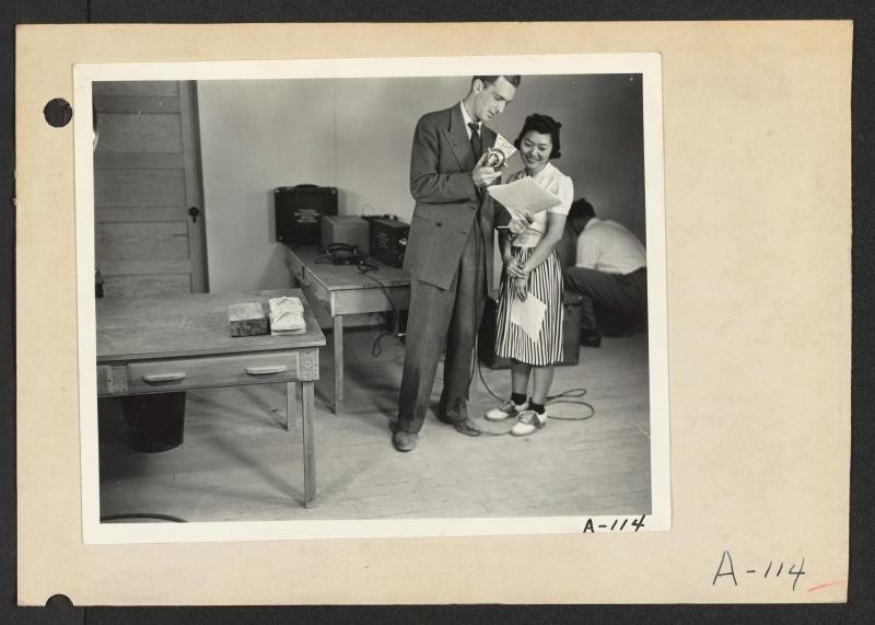 Man and woman in a room.