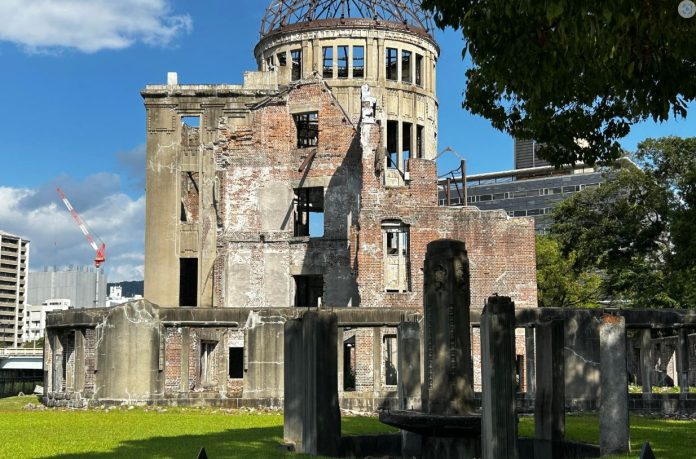 The atomic bomb dome in Hiroshima is a living monument and reminder of the destruction of the atomic bomb drop on Hiroshima during WWII.