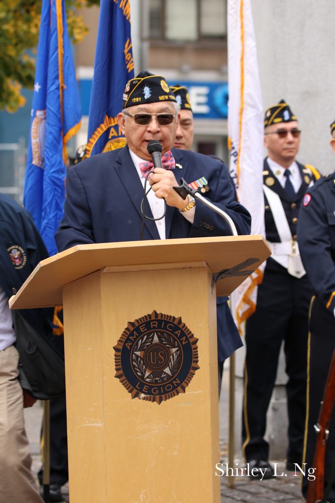 American Legion Lt. B.R. Kimlau Chinese Memorial Post 1291 Commander, Thomas Ong speaks during the Veterans Day Parade and Ceremony.