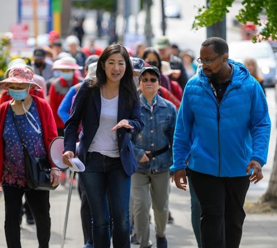 Tanya Woo leads a group of residents of the Seattle Chinatown-International District to City Hall to protest the addition of a homeless shelter in a neighborhood with 20 shelters already concentrated there (Randy Wo-Eng)