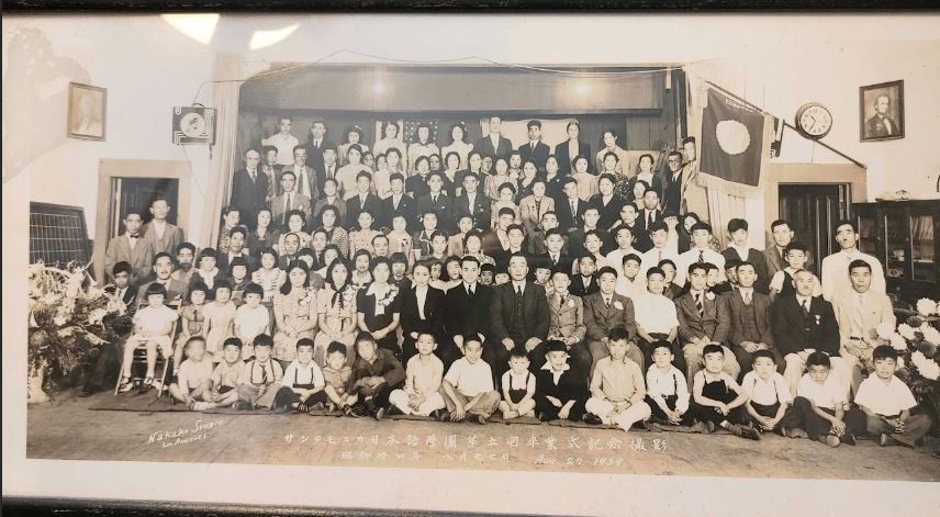 Group photo of Japanese Americans posing at Nikkei Hall in the early days 