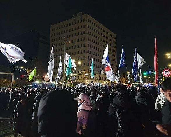 Protesters gather after the declaration of martial law in South Korea