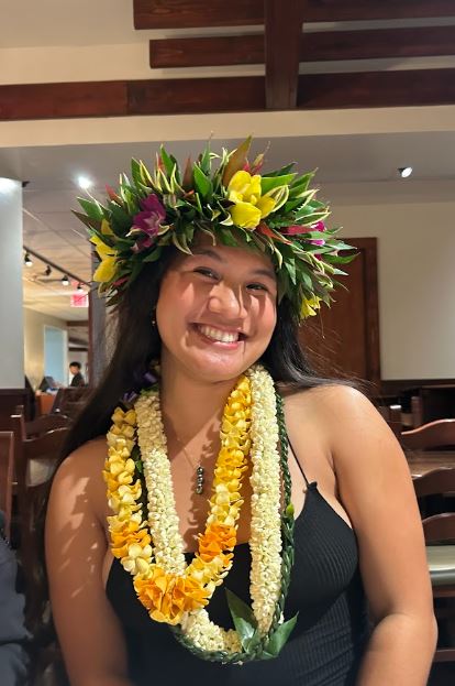 Kawaialoha Yamamoto wearing a leis on her head