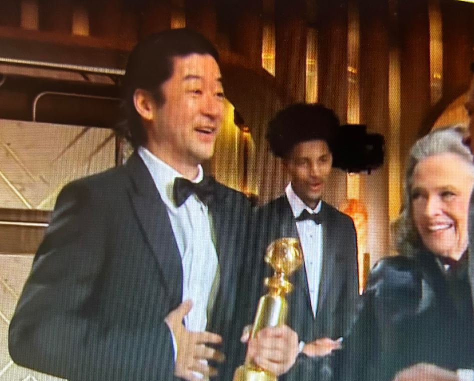 Tadanobu Asano clutches his Golden Globe as he accepts the award for best supporting actor in a TV drama for his role in Shogun. 