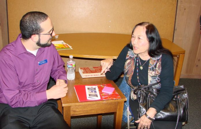 Jeanne Wakatsuki Houston sits down for an interview at the Monterey Public Library