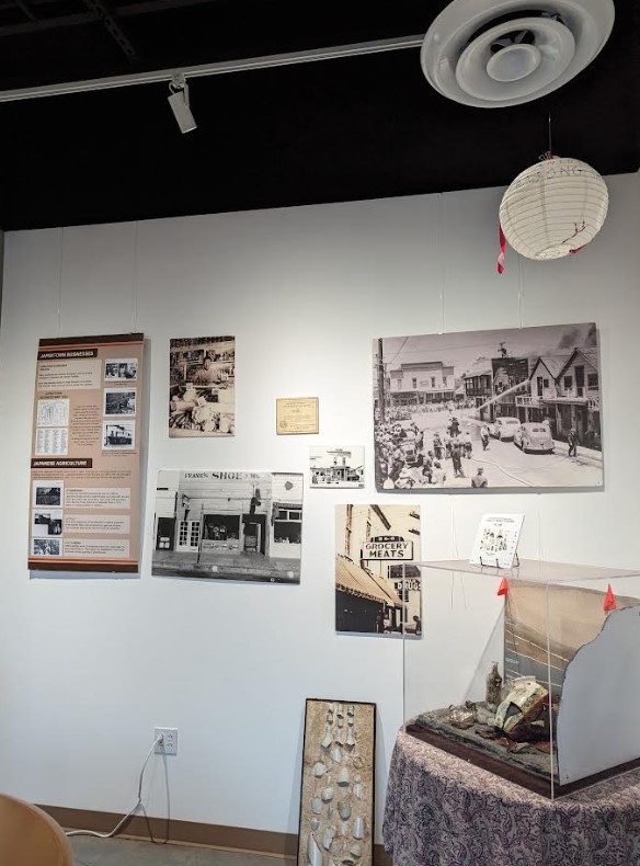 Historical photos hang on the wall of the Salinas Chinatown pilot museum