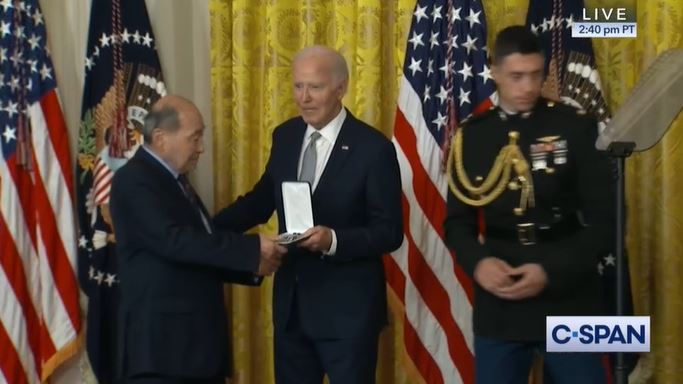 Wayne Tsutsumi accepts the Presidential Civilians Medal from President Biden on behalf of his late mother, Mitsuye Endo Tsutsumi 