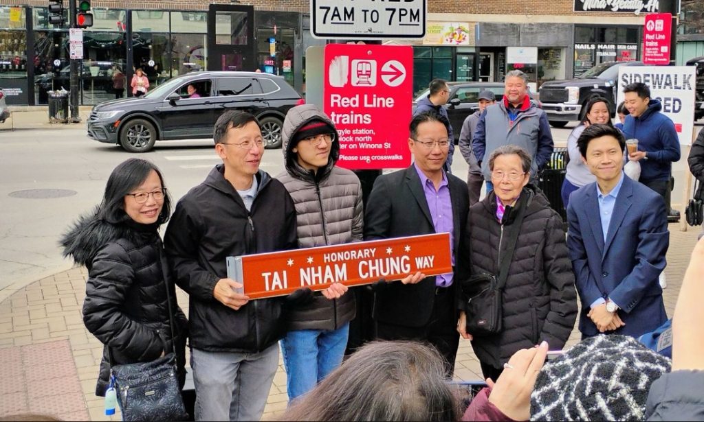 Members of the Chung family with IL State Representative Hoan Huynh