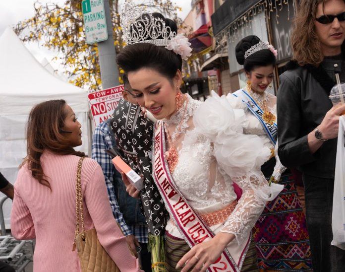 Miss Thai New Year USA 2025 Suntrey Schaffer makes her way through the crowd