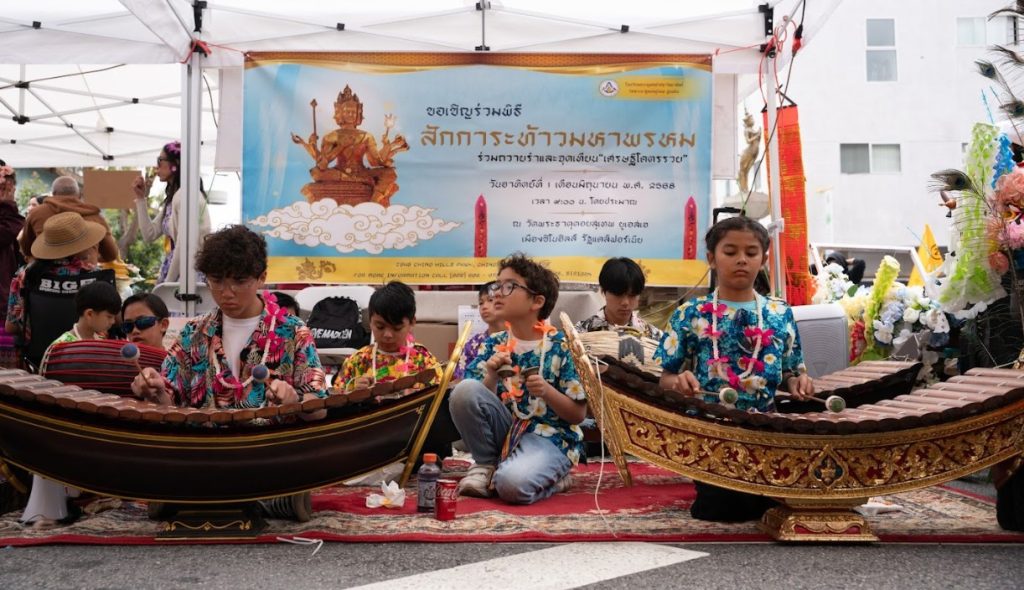 Dancers perform traditional Thai choreography on stage at Thai New Year Songkran Festival 2025 in Los Angeles.