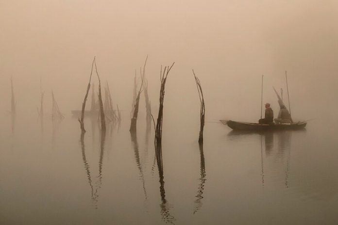 Fishing at sunrise