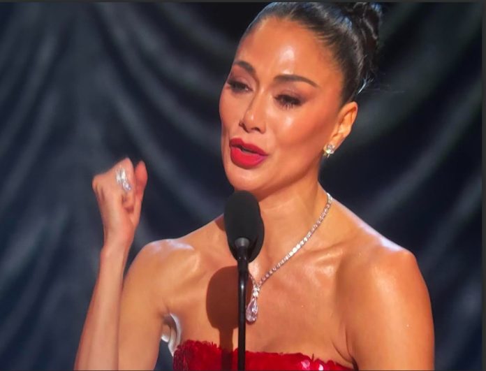 Nicole Scherzinger accepts Tony for best actress in a musical.